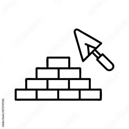 Bricks stacked with trowel for building in construction concept  