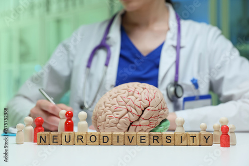 This is a representation of neurodiversity depicted through a brain model alongside supportive figures or symbols