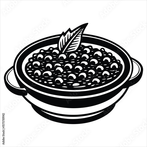 A hearty bowl brimming with savory beans and topped with a fresh herb garnish, presented elegantly on a saucer