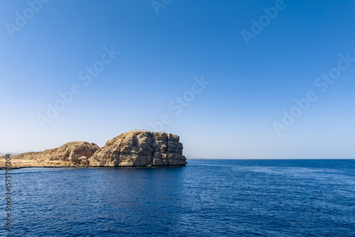 A rocky outcrop in the Gulf of Aqaba off the desert shores of Ras Mohamed National Park in South Sinai.