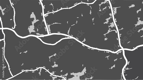 Aerial view depicting roads intersecting through a landscape with scattered water bodies and dark forests