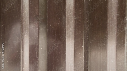 Konstfotografi Industrial brown metal texture with vertical stripes and scratches — ideal backg
