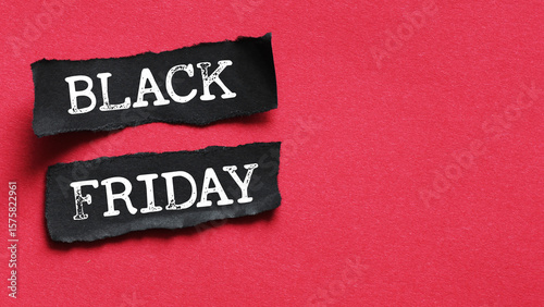 Black Friday words written on a piece of paper. Time for promotions and sales in stores.