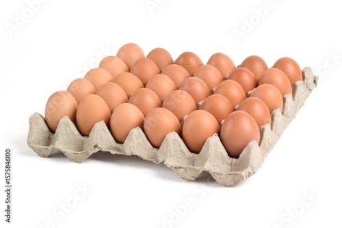 Chicken eggs in cardboard box on white background