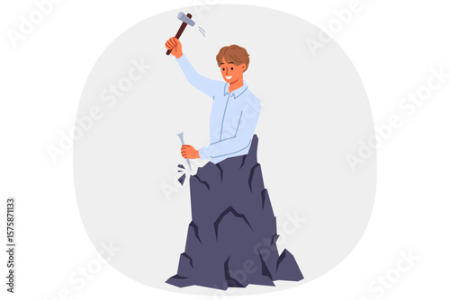 Man makes himself, making efforts for professional development, hollows out own image from rock. Concept of striving for business success and motivation for development and improving life