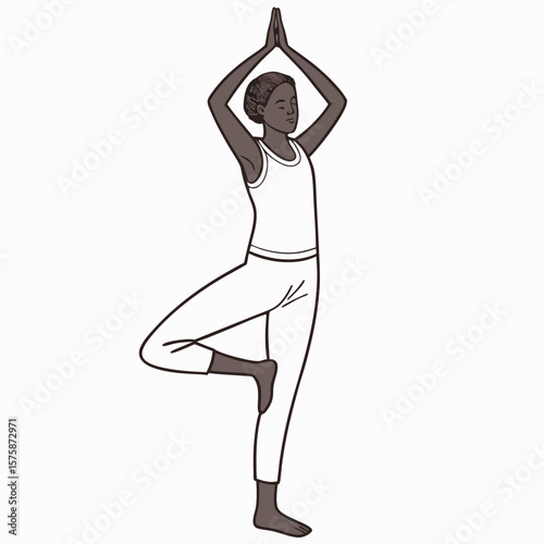 Woman performing tree pose balancing on one leg with hands clasped overhead yoga vrikshasana