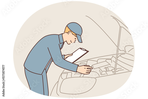 Man auto mechanic with clipboard conducts technical inspection of car standing near open hood