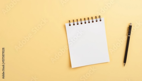 Blank notepad and pen