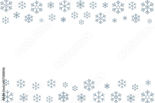 Wintery background presents delicate silver snowflakes on a white space for holiday cards and seasonal designs.