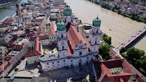 Beatiful panning down shot of St. Stephen's Cathedral in Passau, Germany during a sunny day, UHD