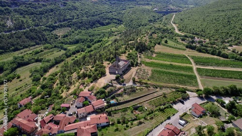 Small Slovenian village with an ancient catholic church and beatiful countryside