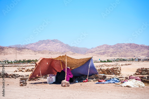 Bedouin desert life under canvas shelter in arid mountain landscape. Dahab, Egypt Jun 11, 2025