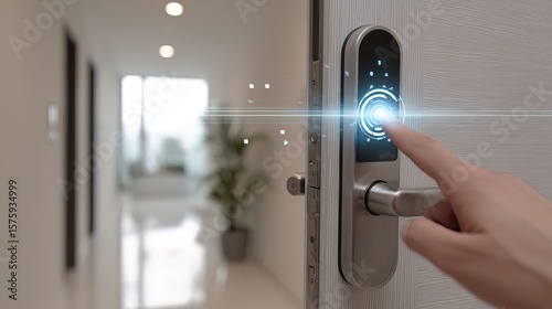 A person unlocking a modern smart door lock with a fingerprint scanner in a bright, minimalistic home interior.
