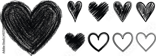 Hand drawn hearts collection. Artistic brush crayon pastel charcoal chalk drawn bold line linear heart shapes. Valentine's day artistic templates set. Rough, textured edge.