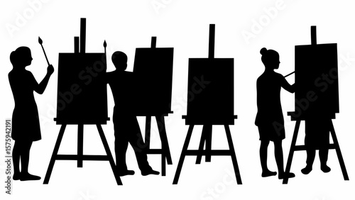 Silhouette of artists painting on canvases with easels in a studio art class setting with brushes in hand