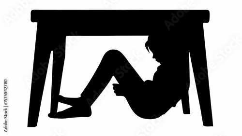 Silhouette of a person sitting under a table in a black and white image with a white background view