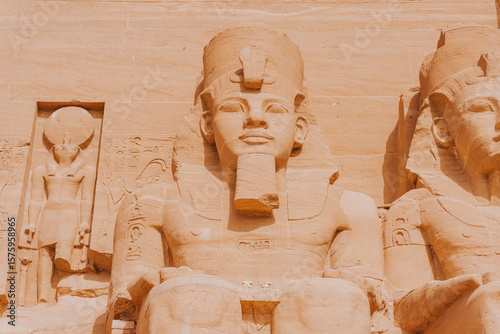 Majestic statues of ramses ii are guarding the great temple of abu simbel