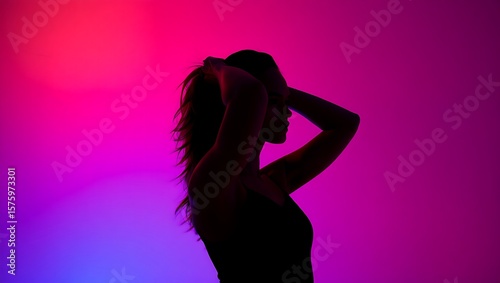 Silhouette of woman against neon gradient background with sensual pose and vibrant lighting