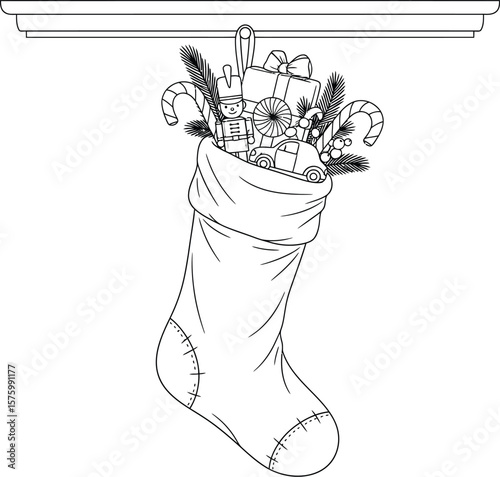 Christmas stocking filled with toys and candy canes hanging from a mantelpiece holiday festive