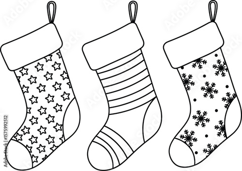 Three black and white Christmas stockings with different patterns holiday winter