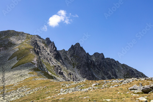 Dramatic mountain scenery in Carpathian Mountains. Retezat National Park wilderness with rugged rocky terrain.