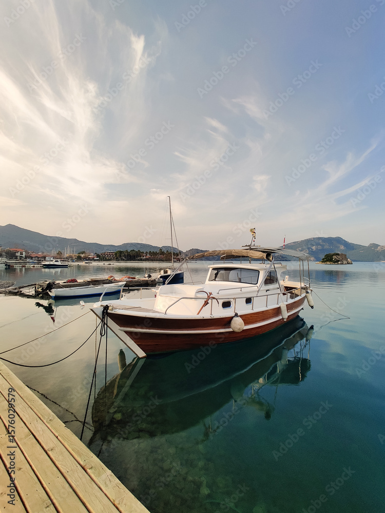 Fototapeta premium beautiful ships and boats are moored near the shore