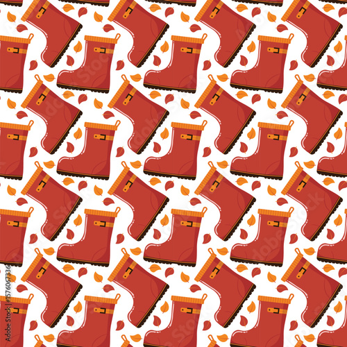 Seamless pattern of rain boots, rubber boots, and autumn leaves