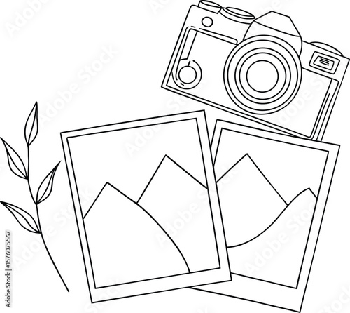Vintage camera and landscape photos with a delicate branch on a white background