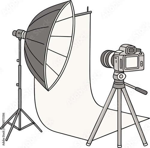 Professional studio setup featuring a dslr camera on a tripod and a softbox light