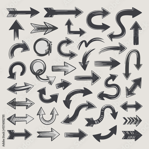 A variety of dark gray arrow designs displayed, suitable for presentations, infographics, and web design projects requiring directional elements.