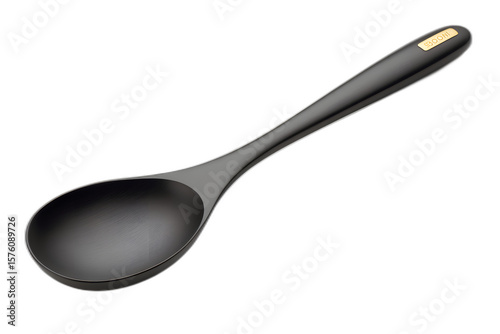 Sleek Kitchen Spoon Resting On Plain Background