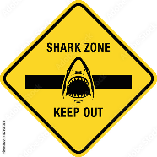 A yellow diamond warning sign with a shark head and the text "Shark Zone Keep Out.".