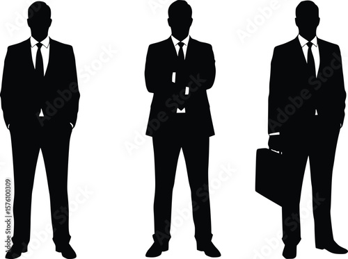 Silhouette showing three individuals in business suits standing confidently with one holding a briefcase