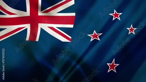 New Zealand flags waving in the wind on a blue background