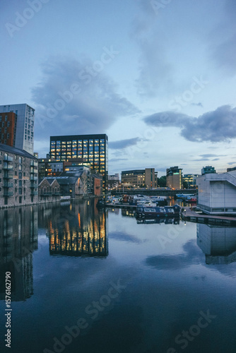 downtown dublin marina skyline with modern buildings and water reflection at night