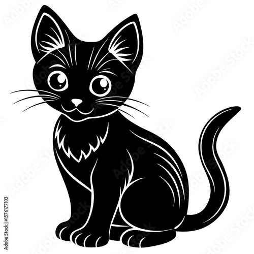 Black kitten sitting with large eyes animal
