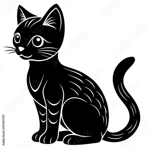 Black kitten sitting with large eyes animal