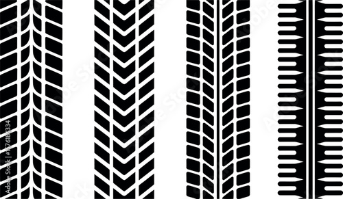 Four distinct black tire tread patterns on a white background