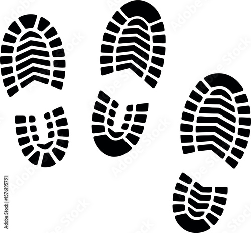 Black boot footprints or shoe prints on a white background