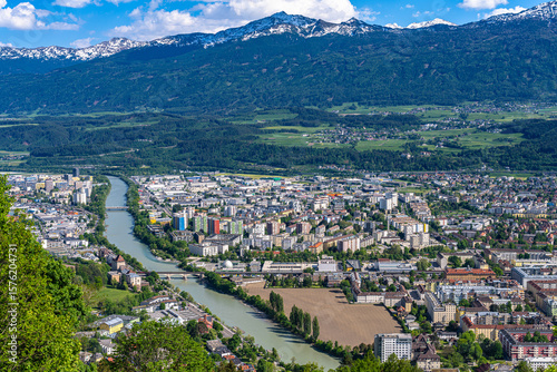 Beautiful aerial panorama view of Innsbruck city and the Tyrolean alps from Hungerburg cable car station on a sunny day in summer, Innsbruck, Tyrol, Austria