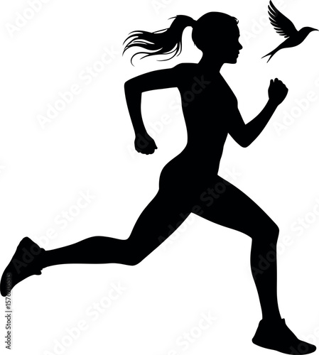 Silhouette of a woman running with a bird flying alongside her