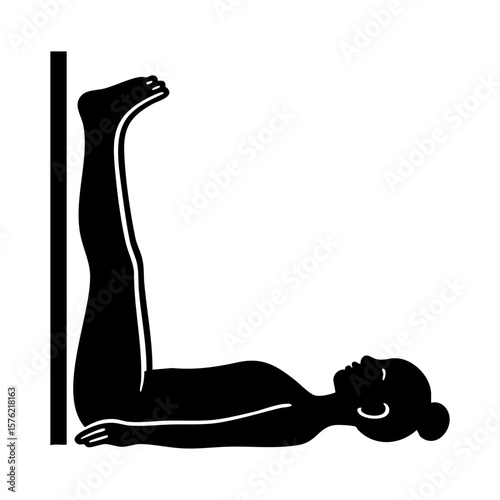 Silhouette of woman in legs up the wall yoga pose for circulation