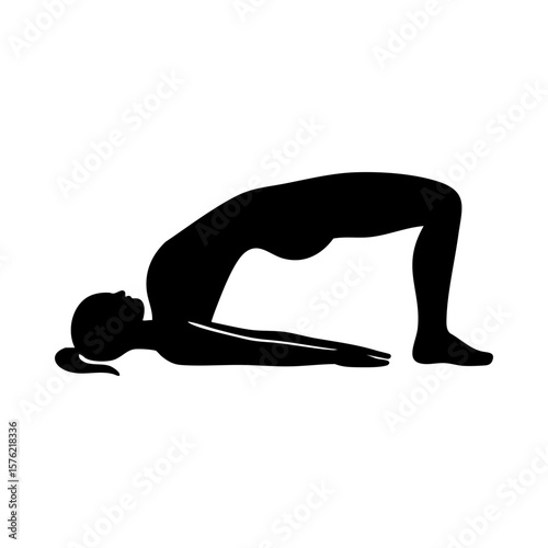 Silhouette of woman lifting hips in bridge pose for back strength