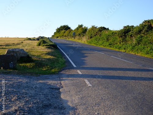 The open road in a Cornish landscape. Different views of small country roads close to Bodmin Moor on a warm summer evening. No cars or people.