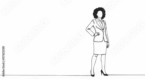 An elegant woman in a suit, standing confidently.