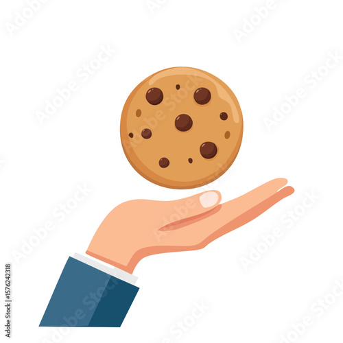 A hand holds a freshly baked chocolate chip cookie