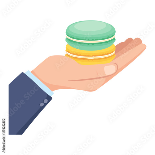 A hand presenting two colorful macaroons. A symbol of sweet delicacy 