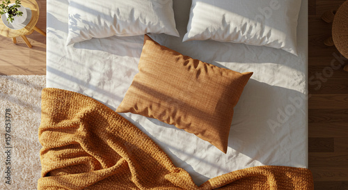 Cozy bedroom scene with sunlight streaming through window onto bed