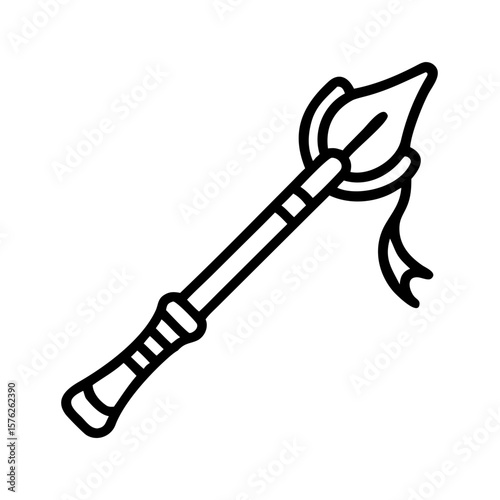 Spear with pointed tip and decorative ribbon on handle  