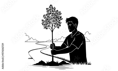 A man plants a young tree, holding it firmly as it takes root in the earth